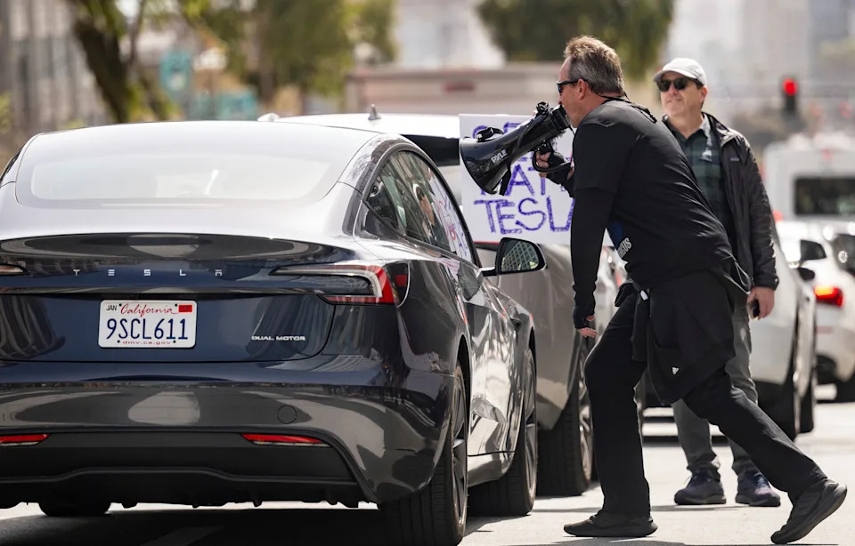 Tesla stock slides as EV maker offers free self-driving trial in China