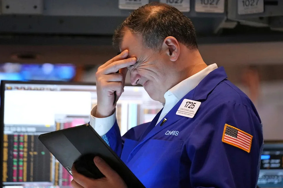 Photos show reactions at the New York Stock Exchange as Trump's tariff announcements sent markets crashing and soaring
