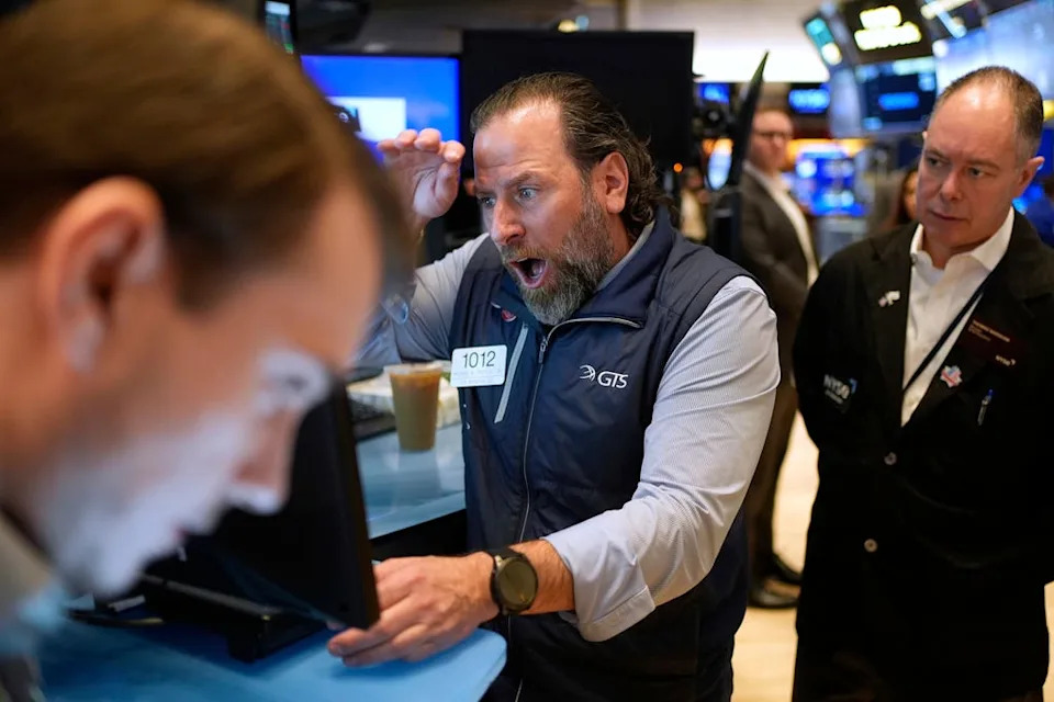 Photos show reactions at the New York Stock Exchange as Trump's tariff announcements sent markets crashing and soaring