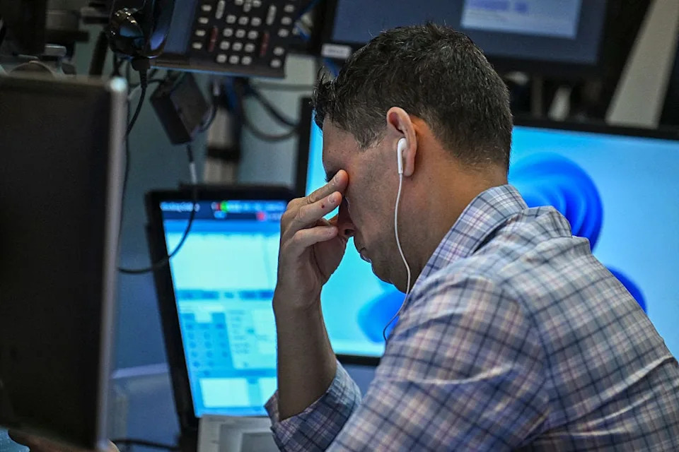 Photos show reactions at the New York Stock Exchange as Trump's tariff announcements sent markets crashing and soaring